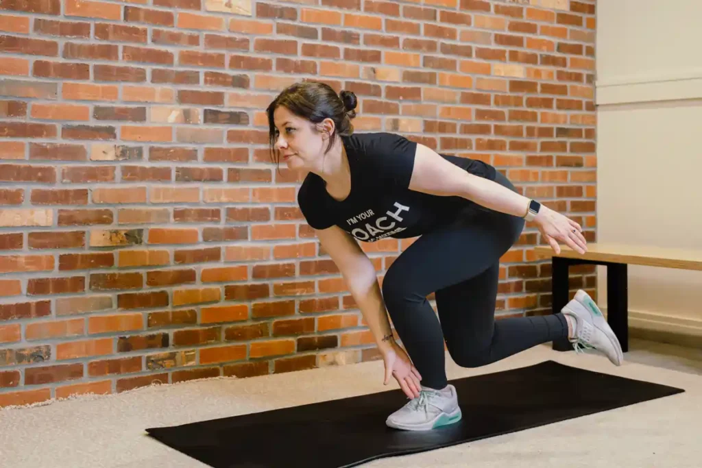 Tone Your Arms in Just One Week: Achieve Results Without the Gym! 1 A person exercising their arms at home with light weights Shepperton Green