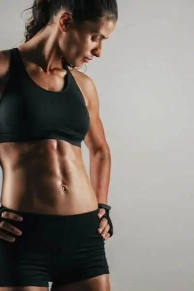 Toning Up at Home: The Ultimate Guide to Bodyweight Exercises 2 Image of woman's toned stomach after bodyweight exercises Shepperton Green and non-surgical treatment from Lipo 360