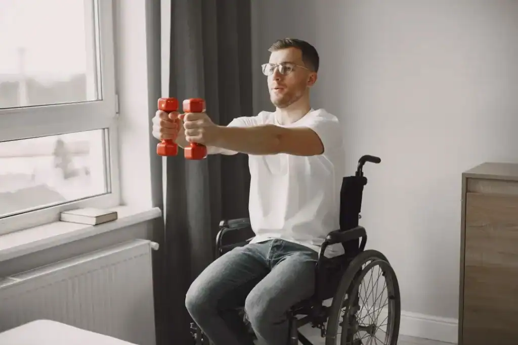 Empowering Weight Loss: A Comprehensive Guide for Individuals with Disabilities 1 Image of man doing exercise in his wheelchair to aid weight loss Shepperton Green