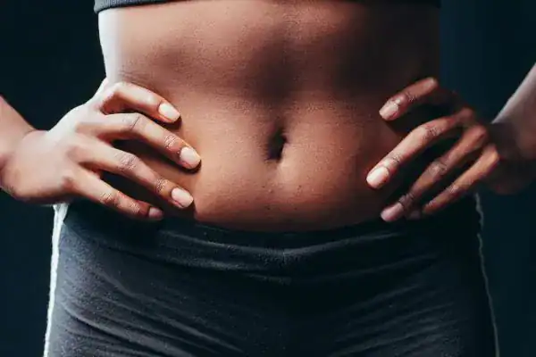 Toning Your Stomach: The Ultimate Guide to Achieving a Sculpted Stomach While Shedding Pounds 1 Image of a toned stomach after non surgical treatment Shepperton Green